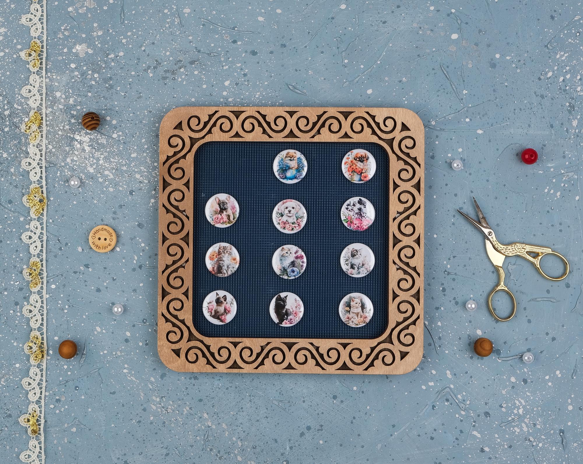 Sampler of traditional motifs pinned on board